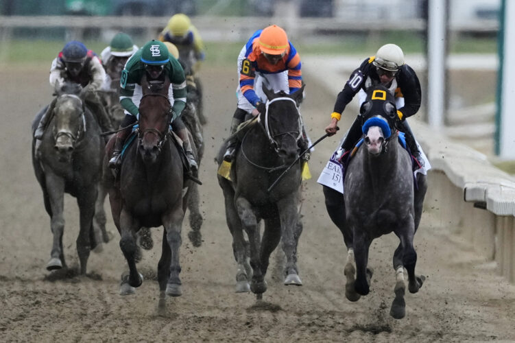 Napoleon Solo holds off Iron Honor by 1 1/4 lengths to win the Preakness at Laurel Park